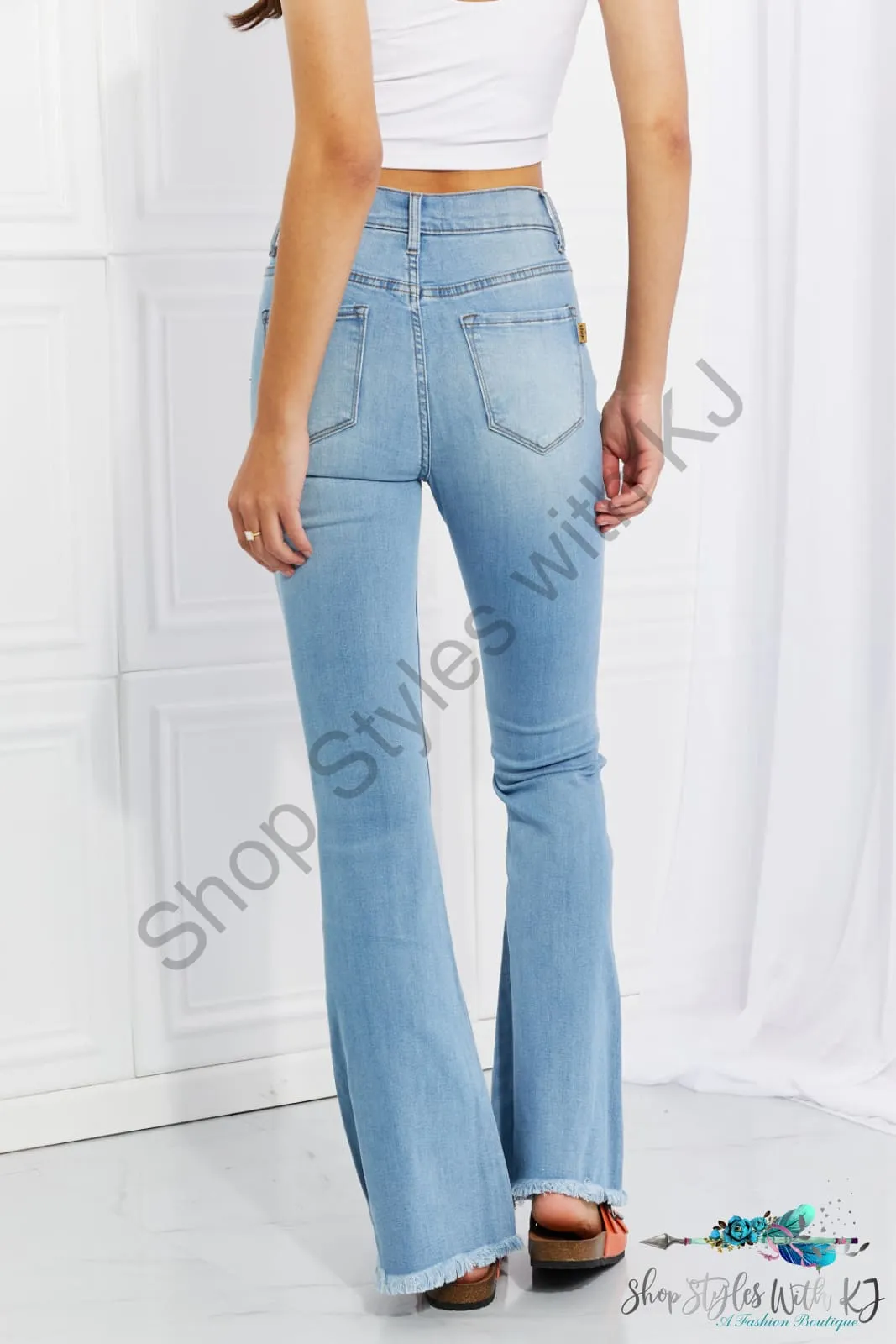 Jess High Rise Button Flare Jeans
